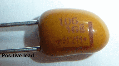 Install the two Tantalum (polarized) Capacitors photo